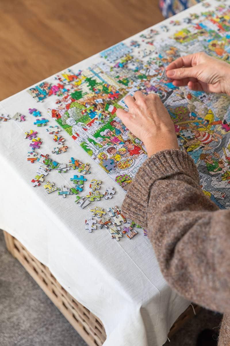 ジグソーパズル ヤン・ファン・ハーステレン ウィンターゲーム 1000ピース ジャンボ社 冬の雪景色アクティビティ多彩なユーモア 隠し要素豊富 高品質リサイクル段ボール使用 約68×49cm 親子共遊び スマートな仕上げ ユニークな芸術作品